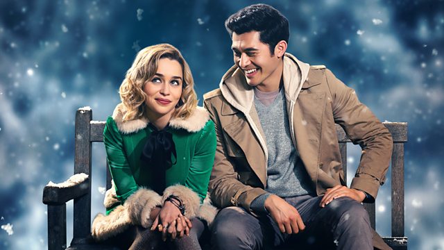 emilia clarke in last christmas sitting on a bench